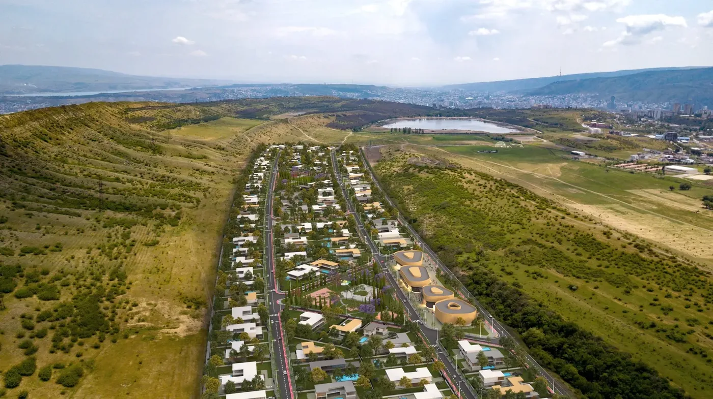 Lisi Topograph on the hillside by Lisi Lake — general view of the community
